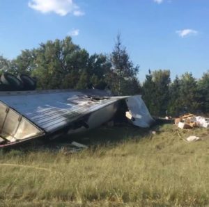 RRN/ Accident near Gibbon interchange late Friday afternoon. One of the vehicles involved, a semi pulling a cargo trailer, overturned in the westbound lanes causing it's cargo to cover the lanes.