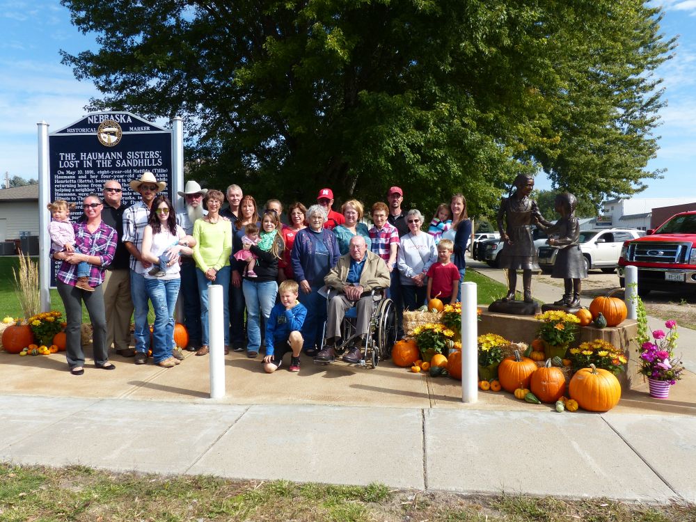 Courtesy/ Terri Licking. The Haumann family members by the tributes dedicated to their ancestors. Six generations call Thomas co. home