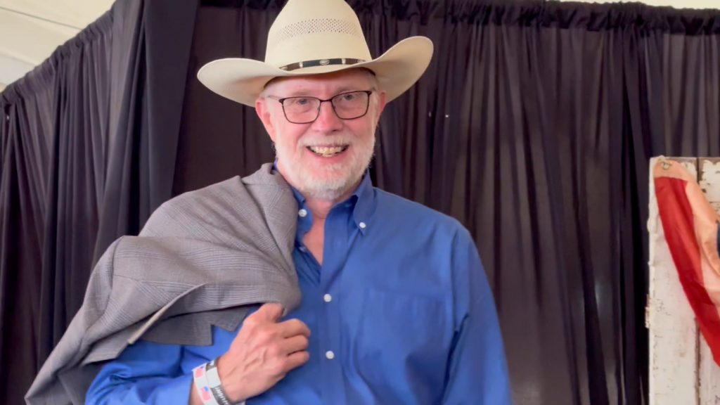 Cancer survivor Don Batie takes the stage at the Cattlemen's Ball