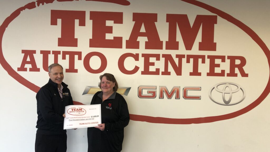 Volunteer Center receives donation from Scottsbluff auto dealership