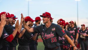 Huskers explode for Six Runs in 9th to stun Gophers